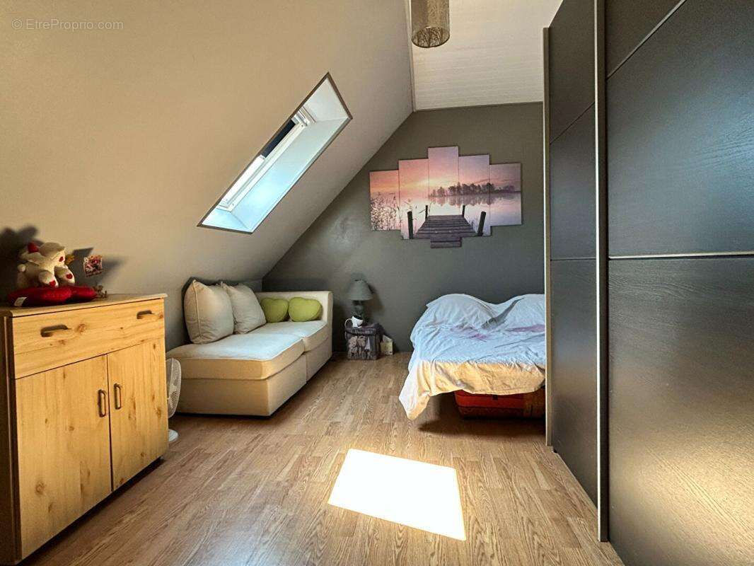 Pavillon individuel eleve sur sous-sol total avec acces voitures - photo 12