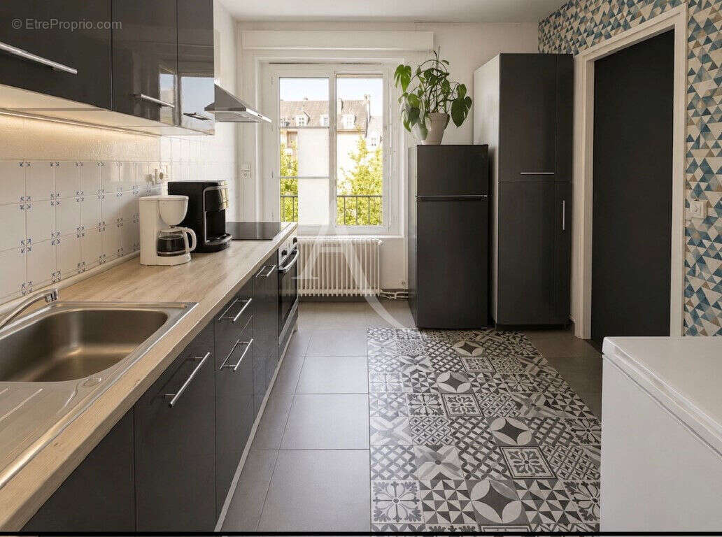 En vente - nevers immeuble de 230 m²  avec 3 appartements - photo 3