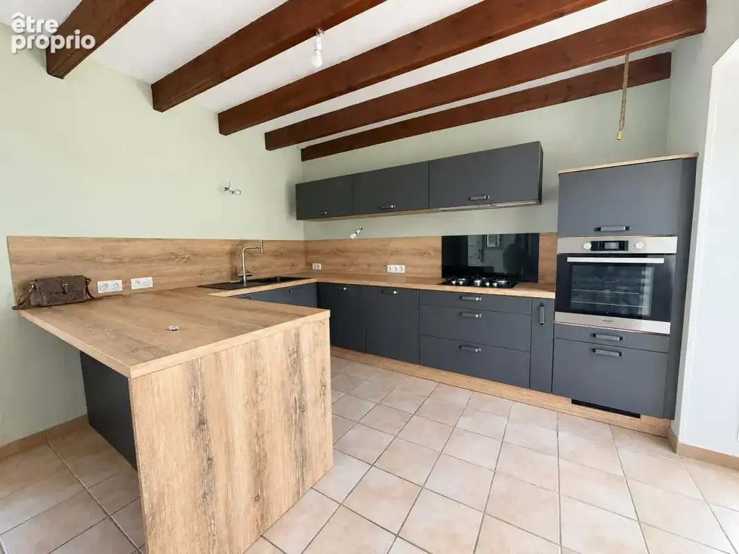 Maison 6 pièces 94 m² à vendre à Le Cloitre-Saint-Thegonnec (29410) - photo 3