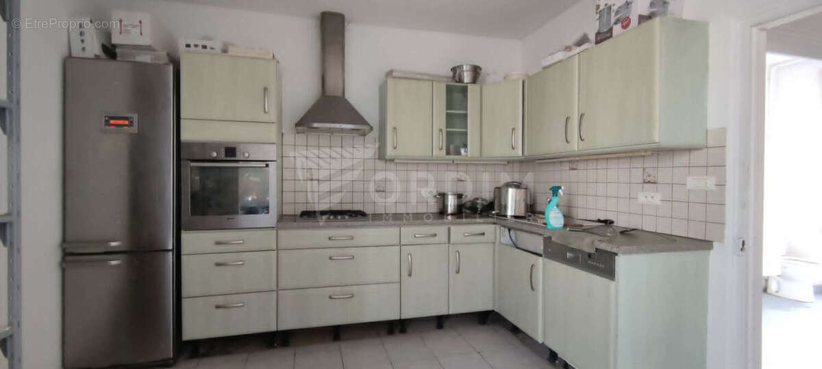 Immeuble de rapport avec local et appartement - photo 3