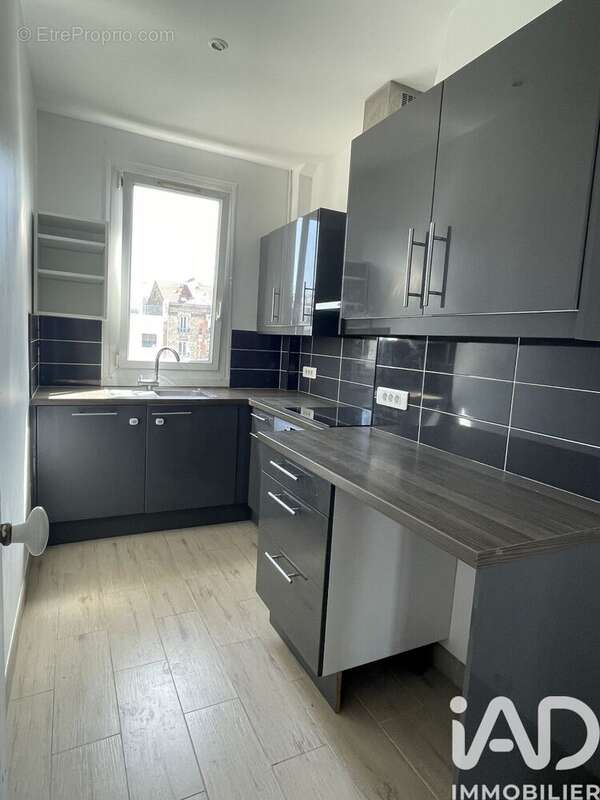 Photo 4 - Appartement à COURBEVOIE