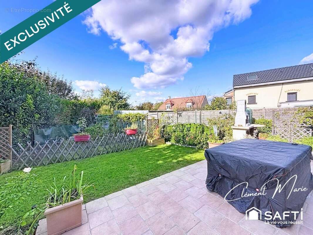 Photo 2 - Maison à BRIE-COMTE-ROBERT