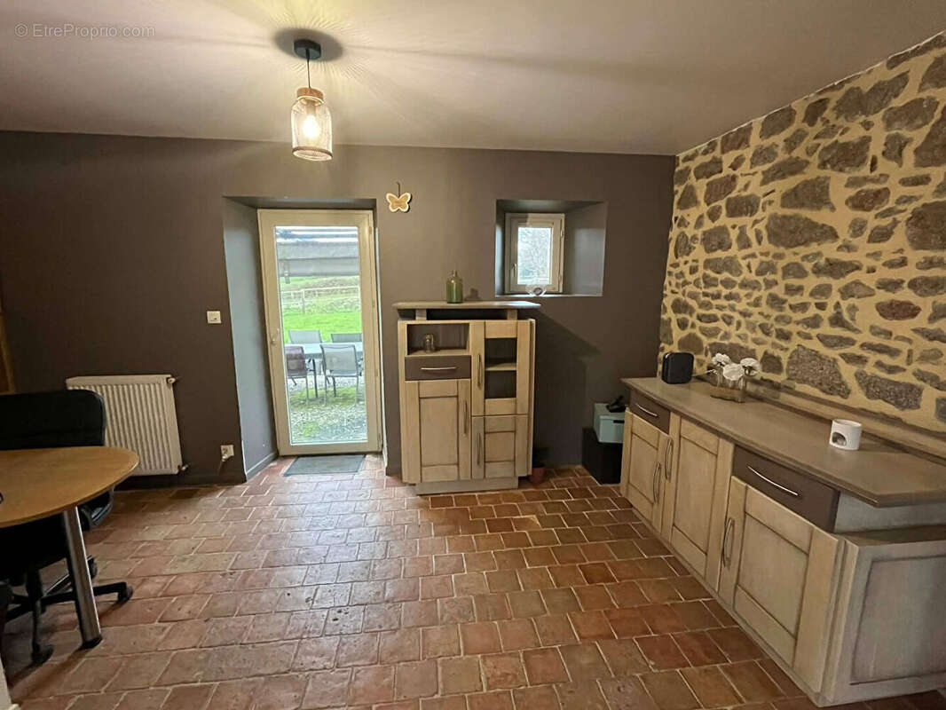Maison à JUVIGNE