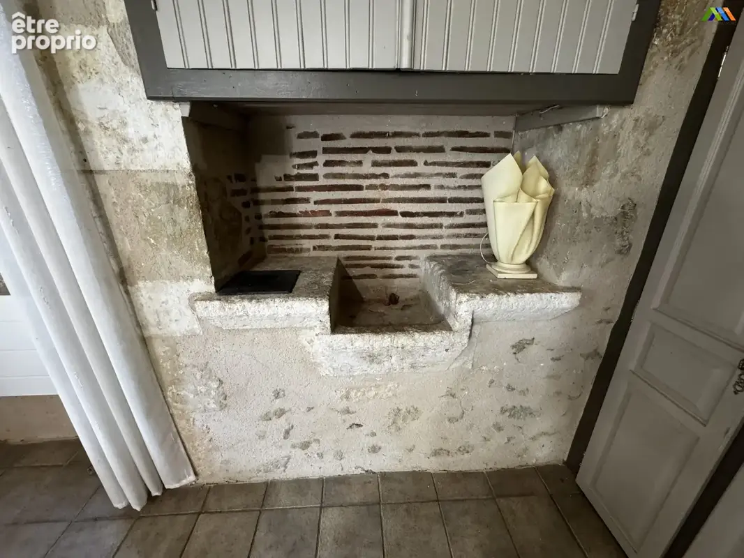Original stone sink and period features