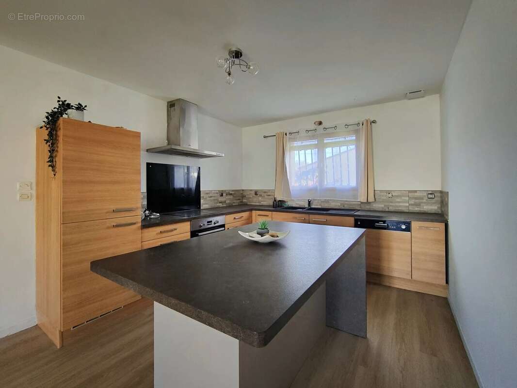 Maison à AYGUEMORTE-LES-GRAVES