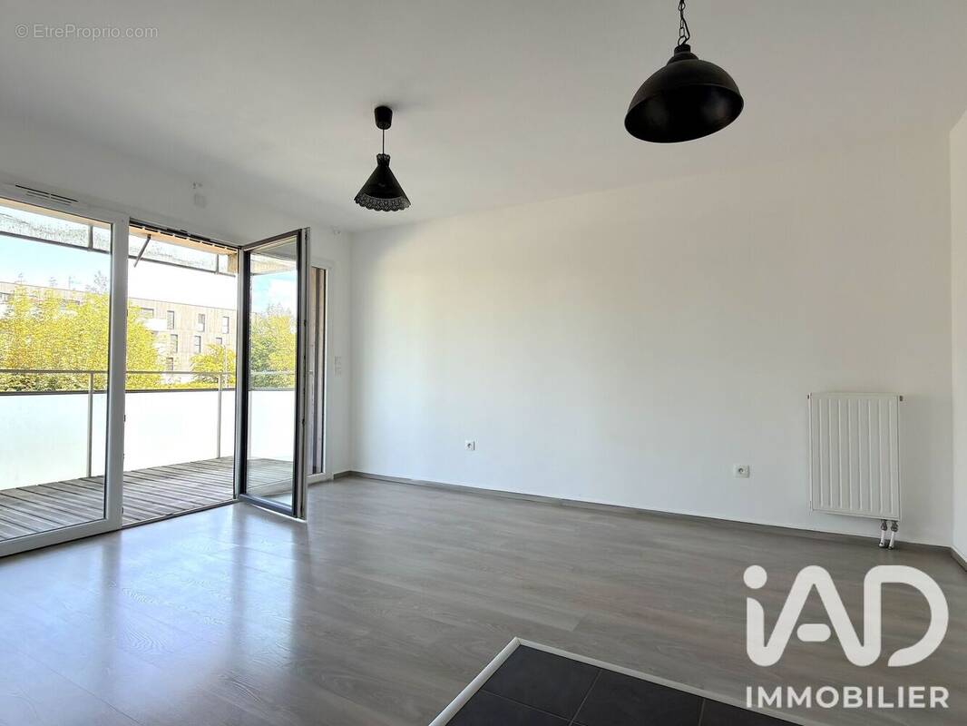 Photo 1 - Appartement à NEUVILLE-EN-FERRAIN