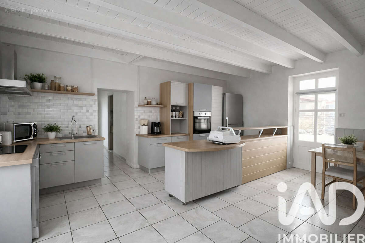 Photo 3 - Maison à LE GUE-DE-VELLUIRE