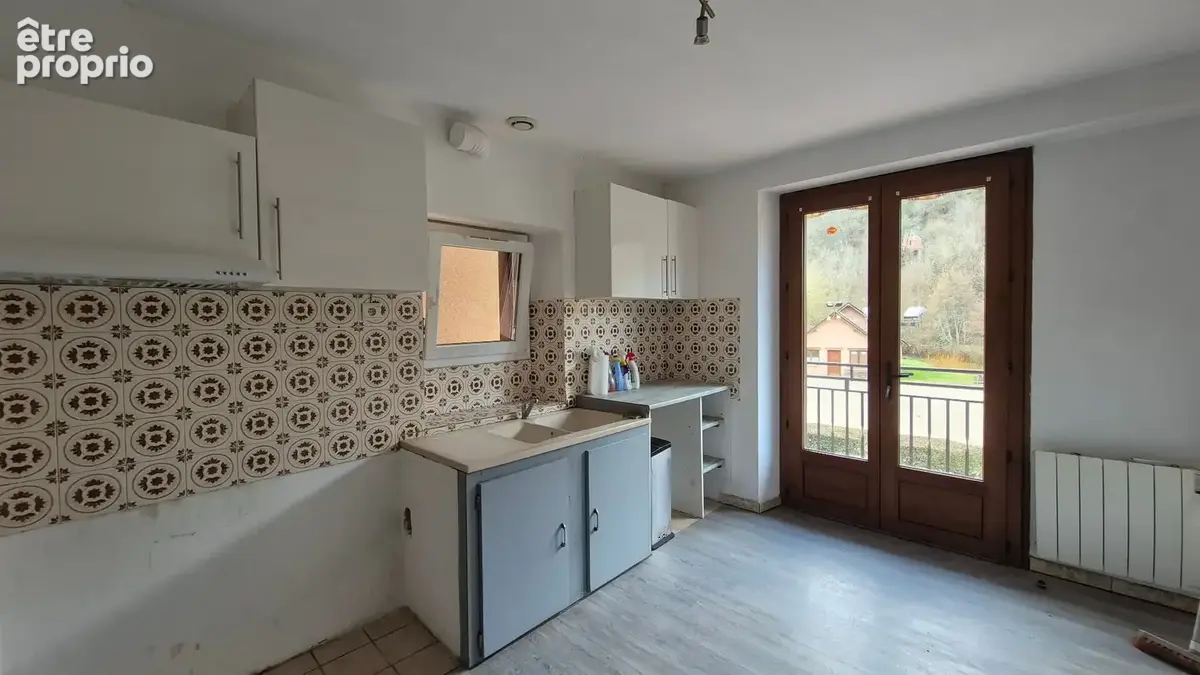 Maison de Type 3/4 avec jardin et garage, coeur de ville de VILLECOMTAL - photo 4