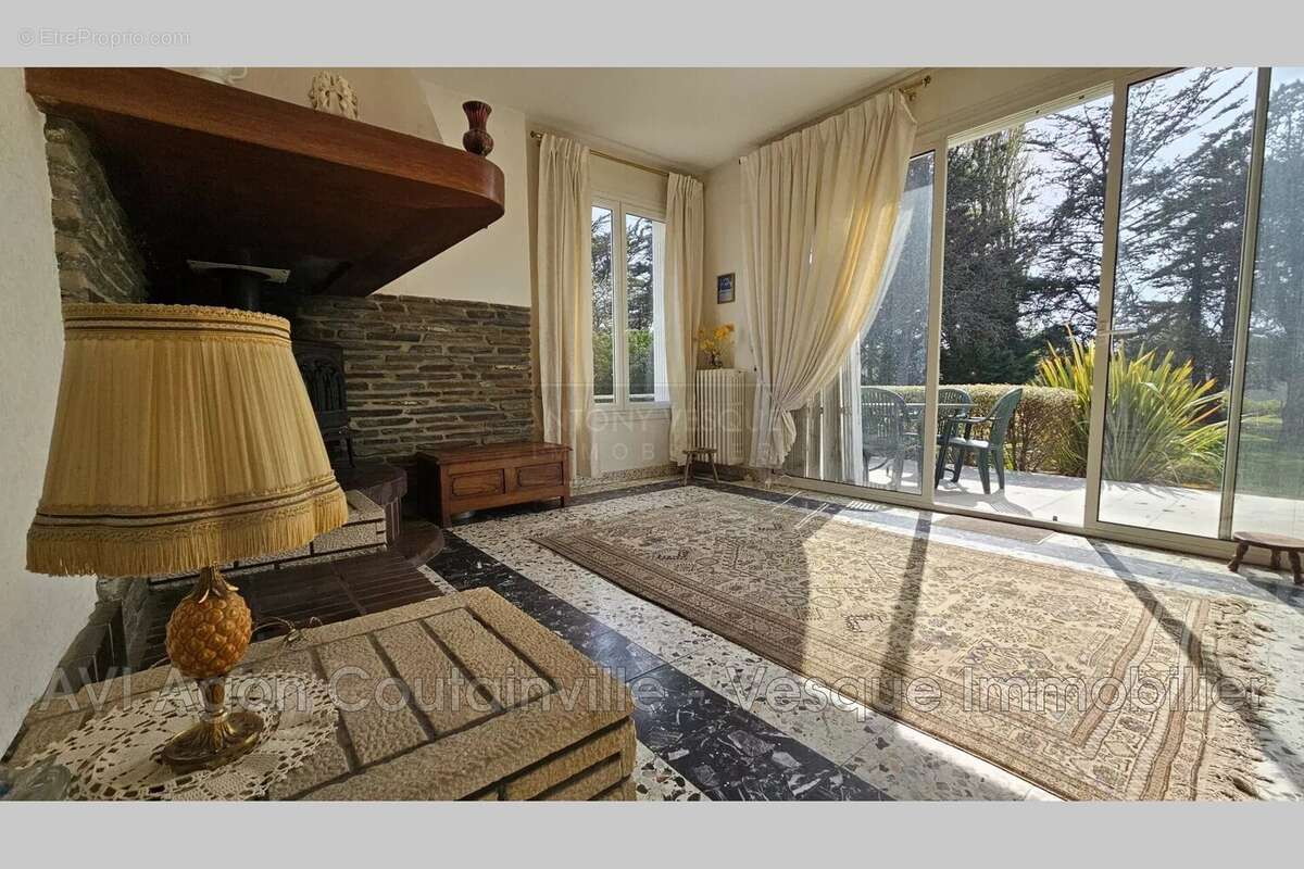 Maison à AGON-COUTAINVILLE