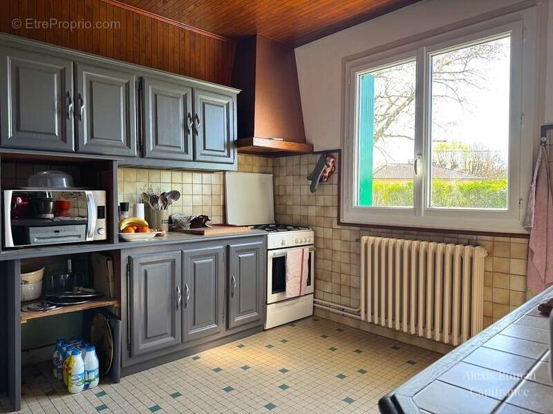 Maison de plain-pied 105 m² + double garage – env. 155 m² utiles – terrain 1 533 m² – proche commodités - photo 8