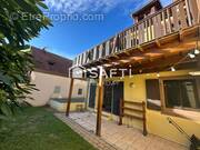 Photo 1 - Appartement à SCHARRACHBERGHEIM-IRMSTETT