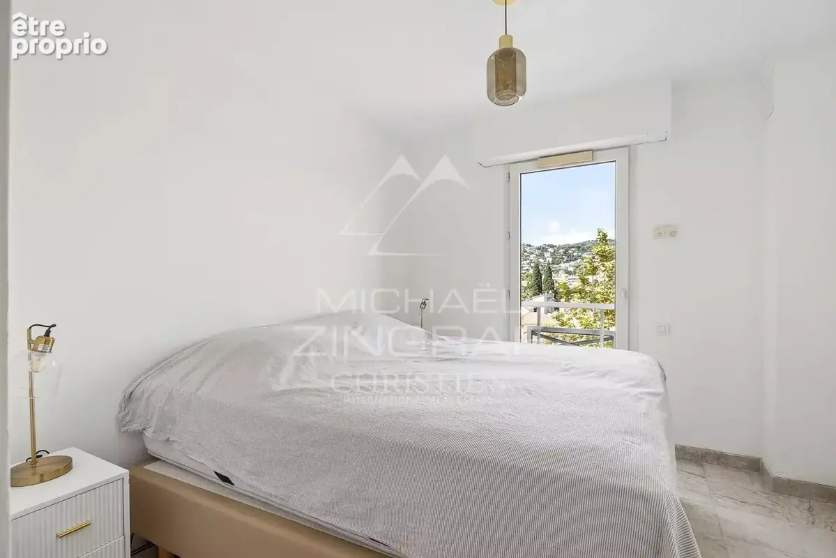 Exclusivité - Golfe-Juan – Appartement traversant rénové avec terrasse, piscine et parking - photo 8