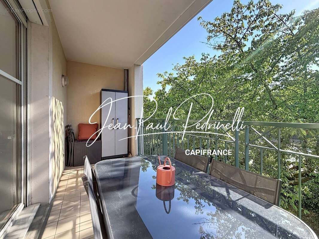 Tassin-la-Demi-Lune - Appartement 2 pièces de 48 m² avec balcon, parking privatif et cave - résidence sécurisée récente - photo 5