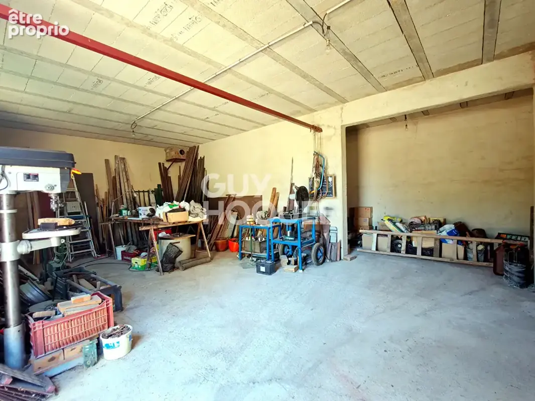 Ensemble immobilier exceptionnel - Maison avec T2 indépendant et plus de 260 m² de garages. - photo 11