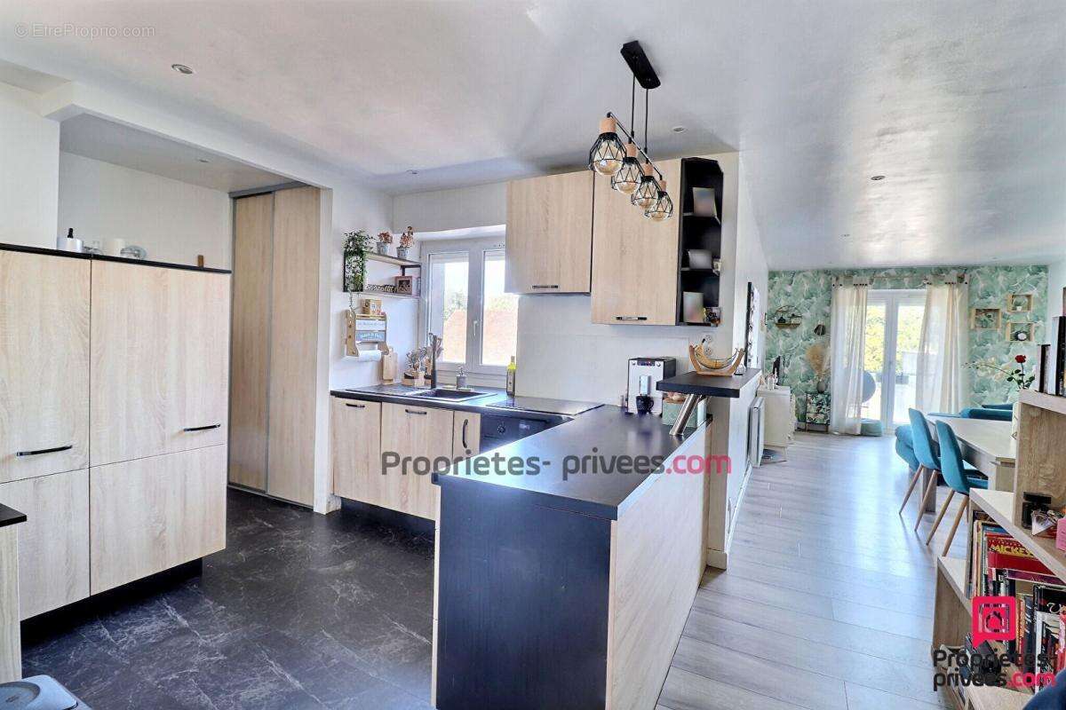 Appartement 4 Pièces avec Jardin Privatif et Garage à Sainte-Geneviève-des-Bois - photo 4