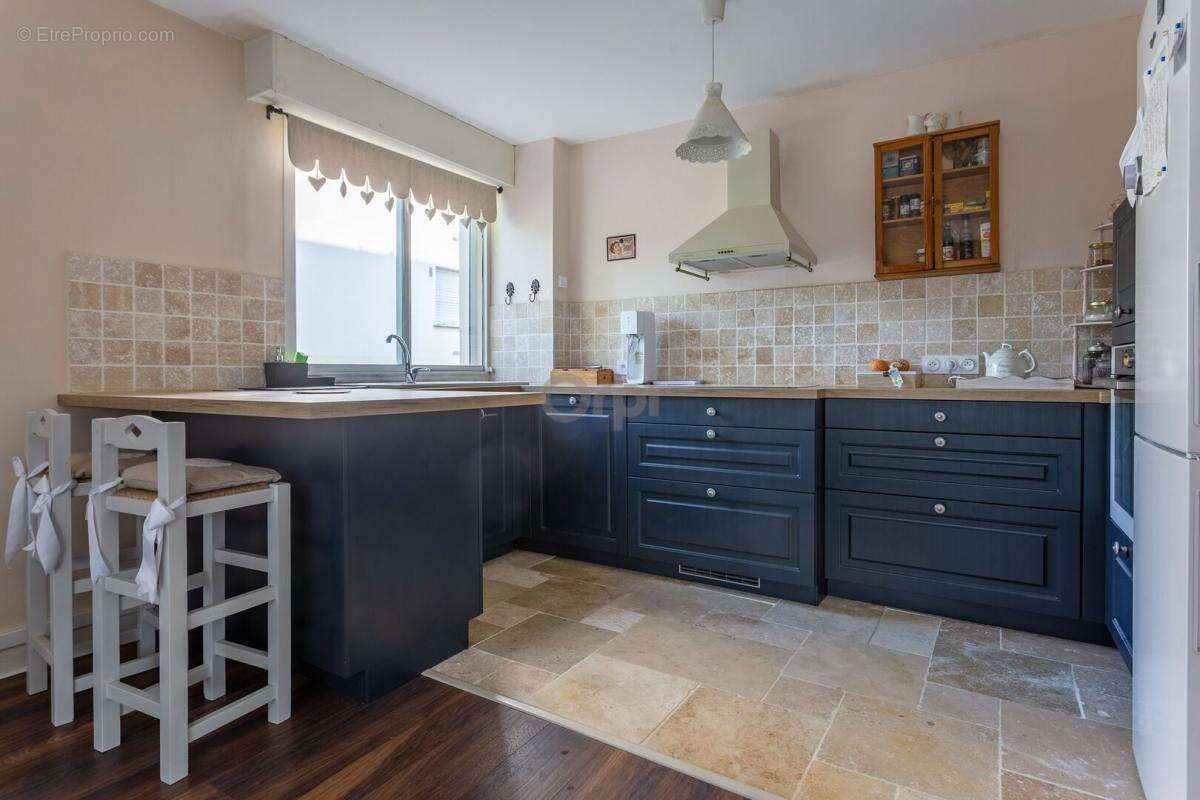 Appartement 3 pièces 63,05 m² BALCON - CAVE - PARKING - photo 2