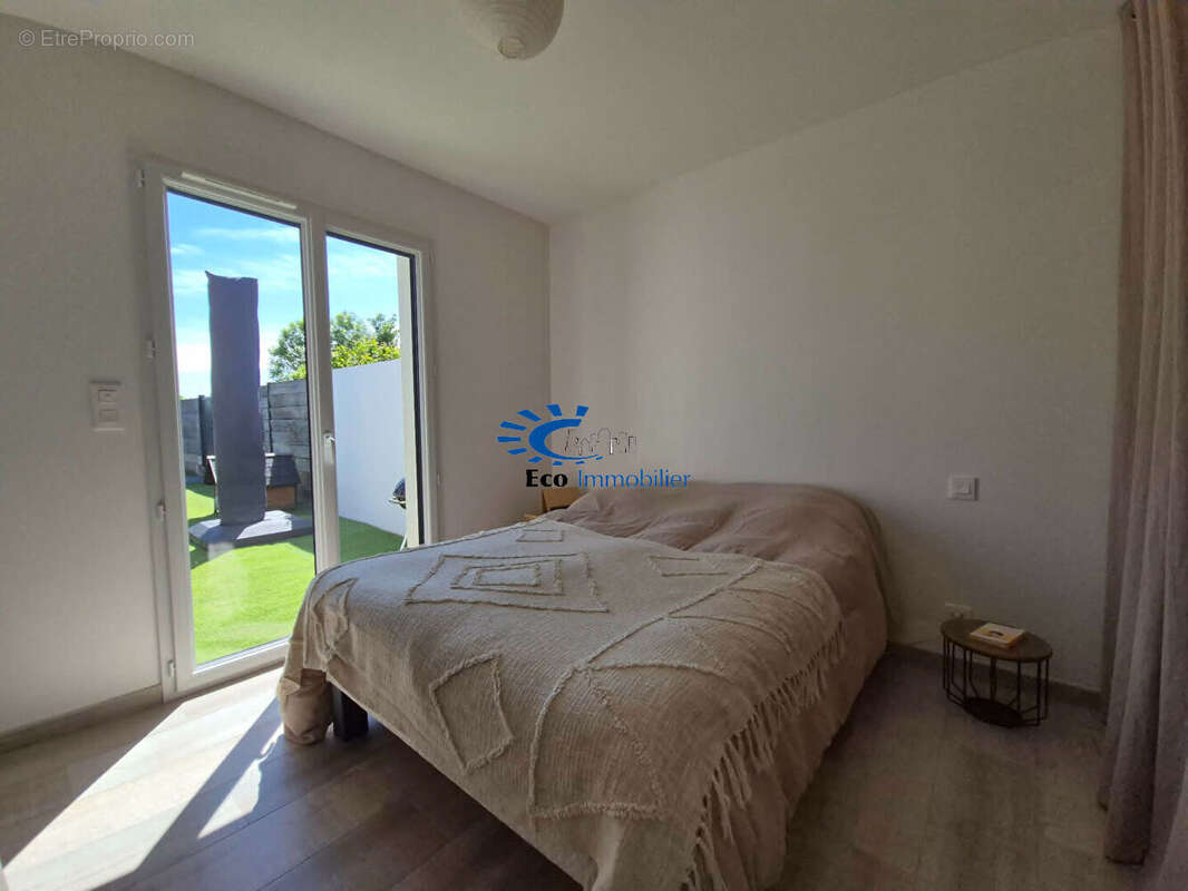 Maison plain-pied 94 m² 3 chambres garage jardin parking - photo 9