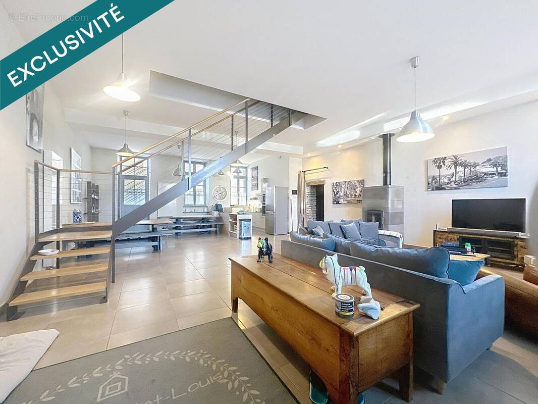 Photo 1 - Maison à CASTELNAU-MONTRATIER