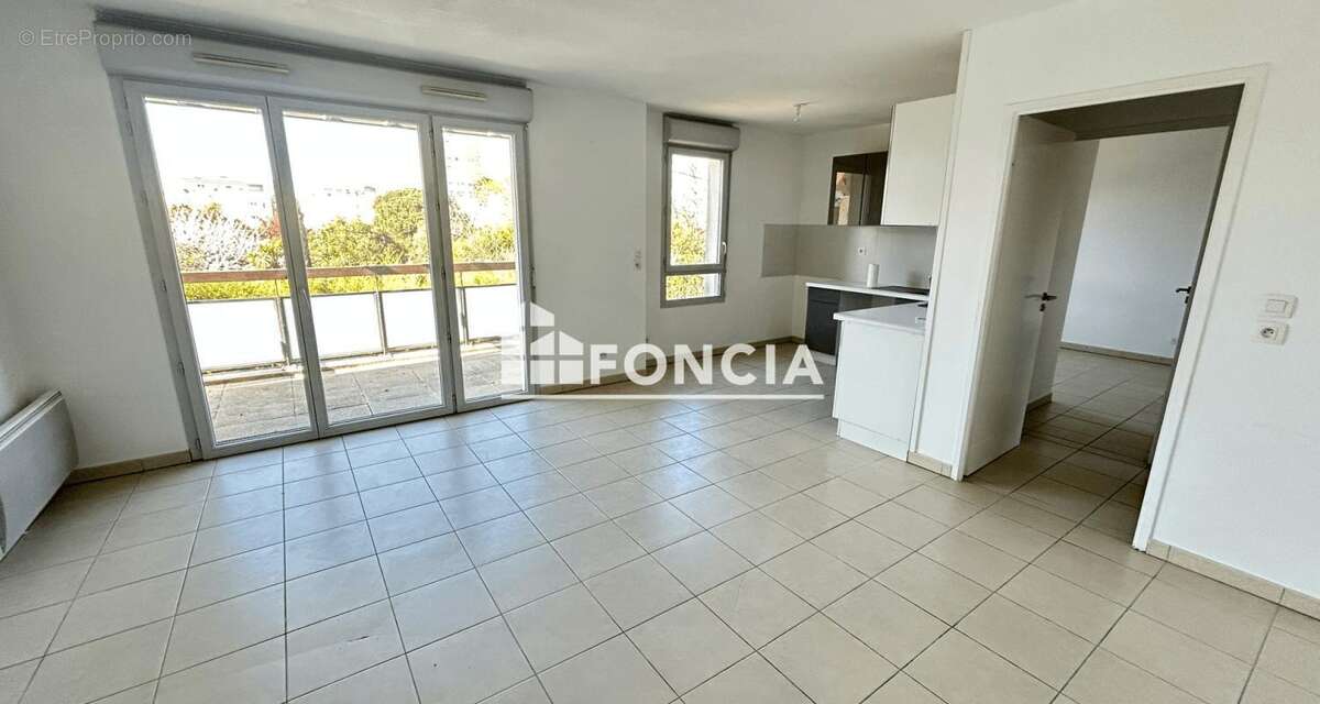 T3 Coeur Guilheméry avec balcon et parking - photo 2