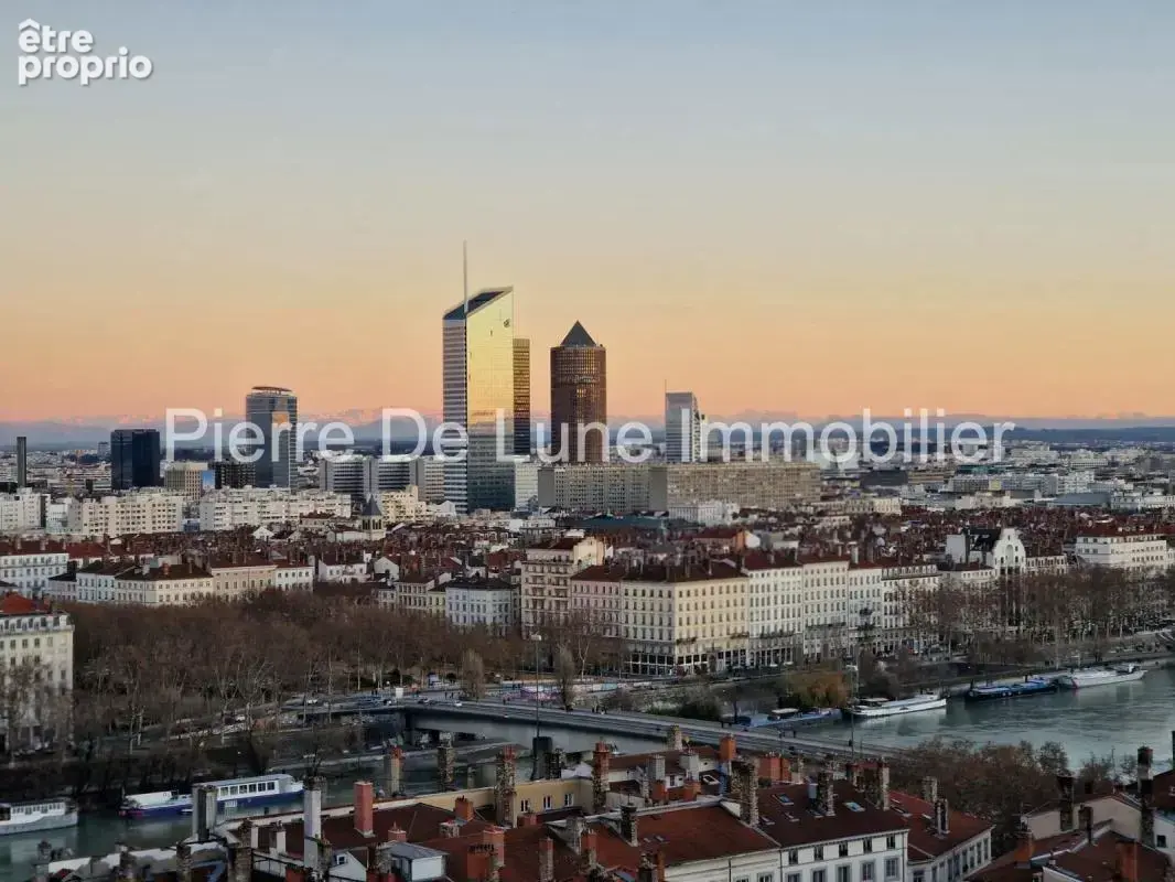 Lyon 1er dernier étage ascenseur 90 m² utiles vue exceptionnelle - photo 9