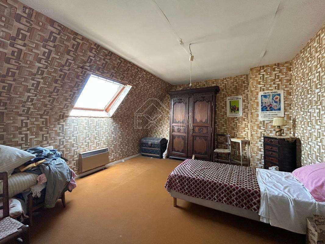 Maison 6 pièces 137 m² à rénover avec jardin, terrasse, sous-sol total et dépendance à Rosny-sur-Seine - photo 15