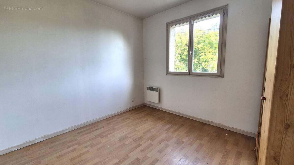 chambre 1 - Maison à BOUTIGNY