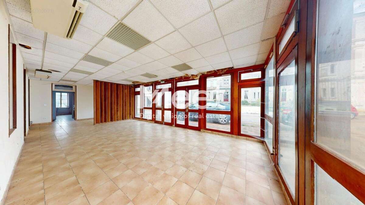 Local commercial - 7 chambres - photo 5