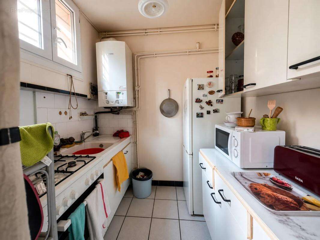 Immeuble de 9 pièces de 180 m² à Béziers (3 T2 et 1 T3-duplex) - photo 7