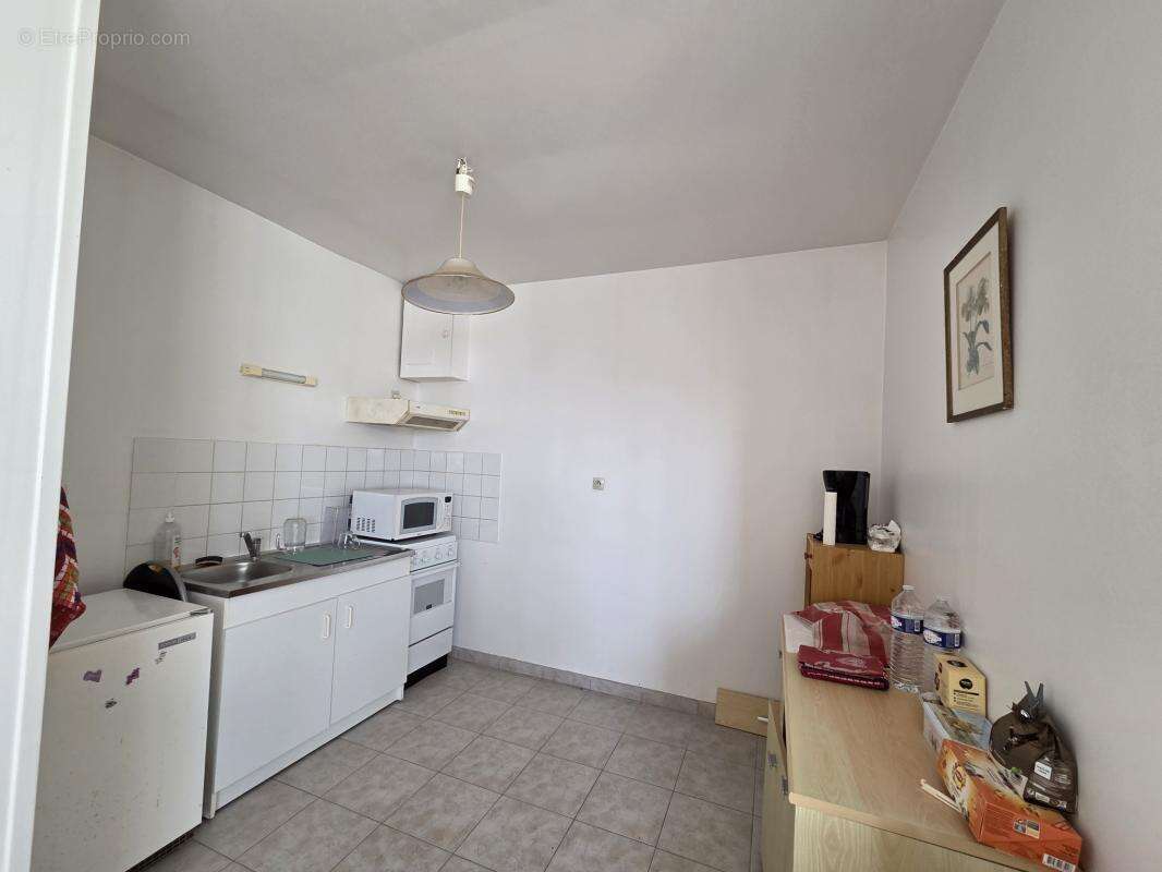 Ensemble immobilier 3 logements-parking- centre bourg neulli - photo 14
