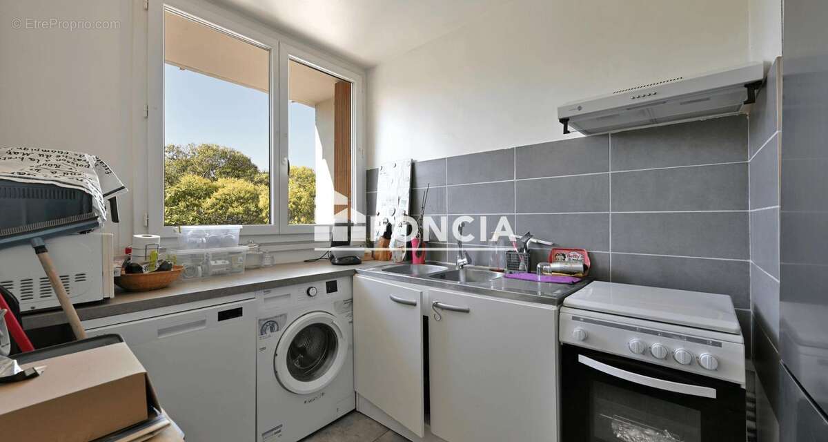 À vendre – Appartement T2 traversant de 52 m² avec terrasse, garage, cave et locataire en place - photo 6
