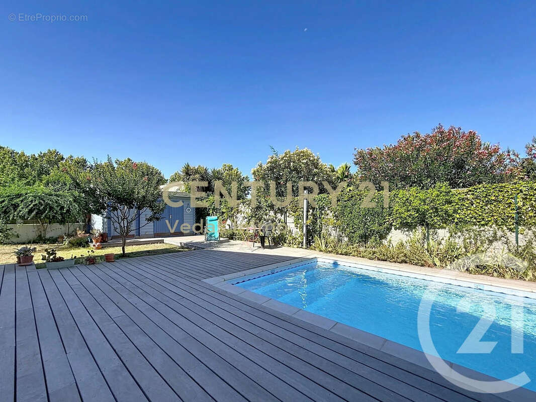Maison 176 m² à Laverune  - photo 2