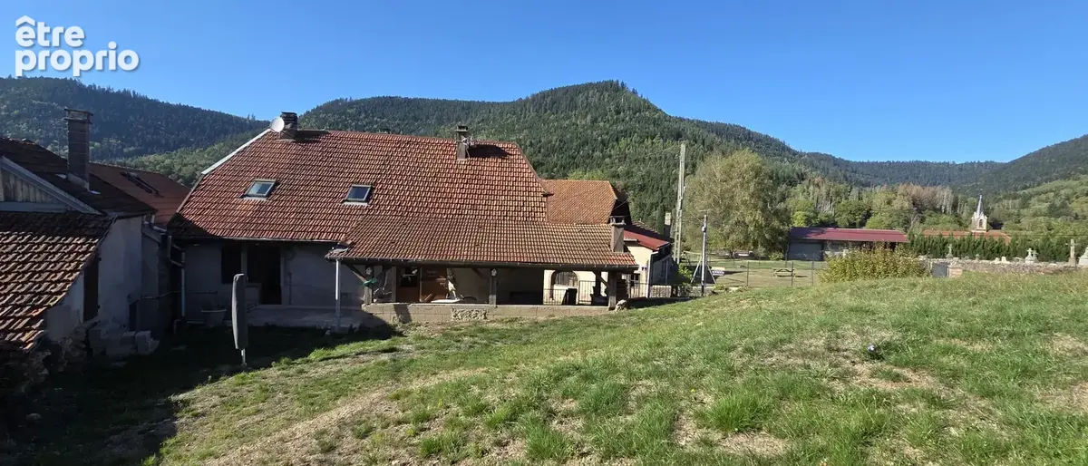 Raon-Sur-Plaine, authentique ferme vosgienne de 1844 à fort potentiel, divisée en deux logements avec jardin e - photo 2
