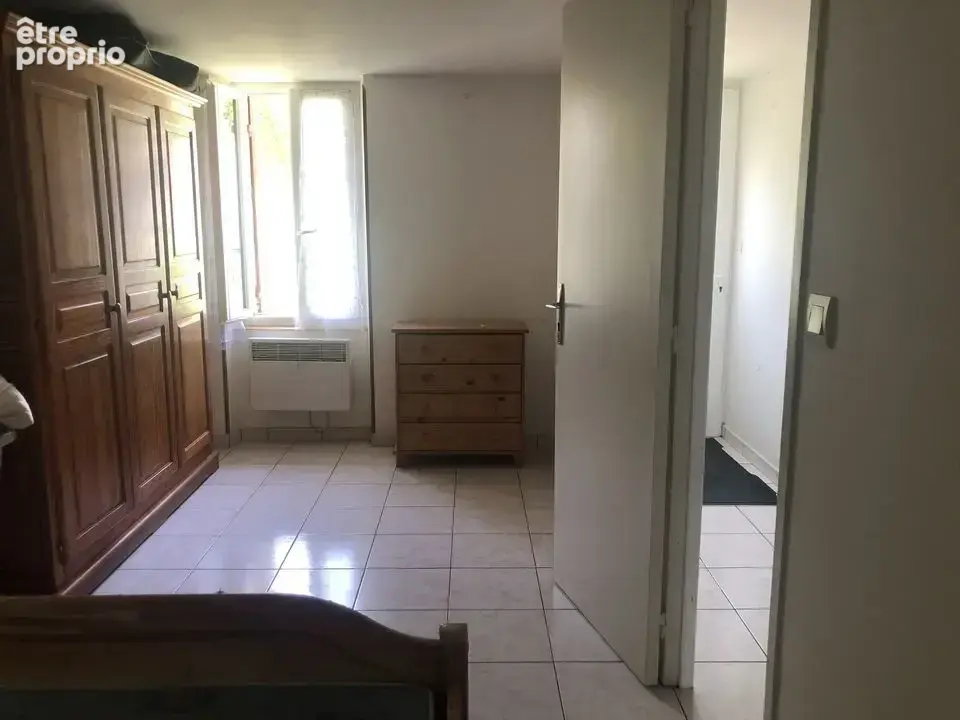 Jolie maison mitoyenne en pierre avec son grand jardin 900 m2 - photo 6