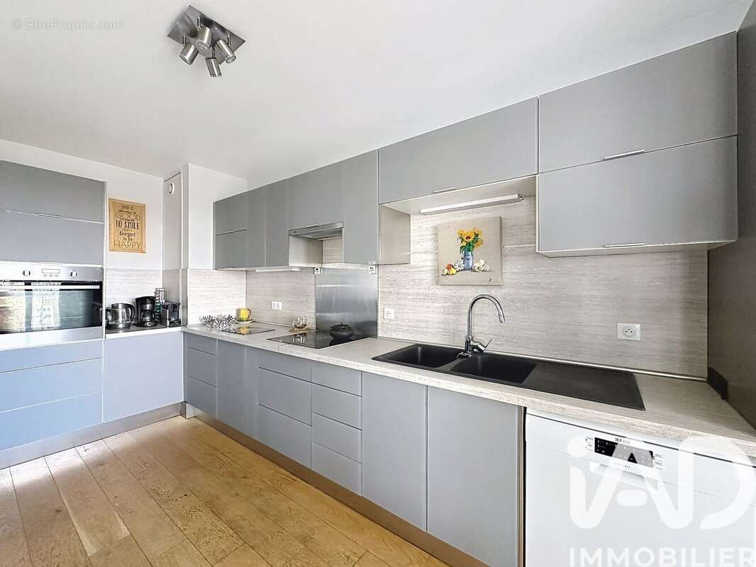 Photo 9 - Appartement à COURBEVOIE