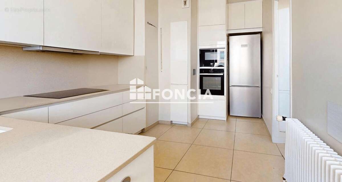 Exclusivite place catalogne t5 + cave + parking - photo 5