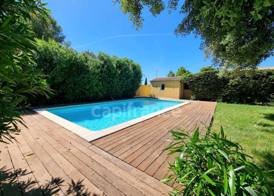 Villa de plain-pied de 156m² avec 6 pièces + une dépendance - Terrain arboré de 1400m² avec Piscine - (34160) - photo 5