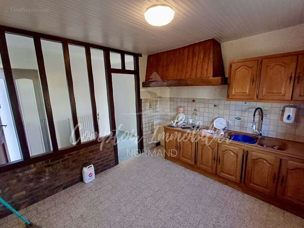 Maison à THIL-MANNEVILLE