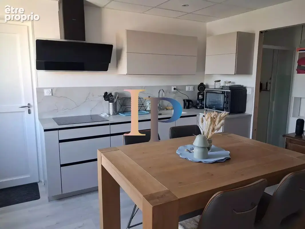 Appartement renove + garage. - photo 2