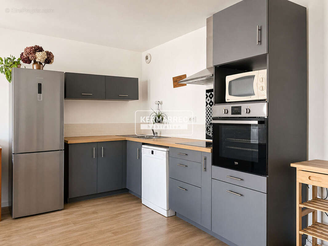 Appartement La Courrouze - T4 - 75m² - 3 chambres - Balcons - Stationnement - photo 4