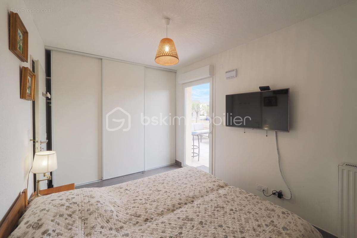 NÎMES CAPOUCHINÉ – Superbe T4 de 96 m² avec Terrasse d'Exception de 57 m² ! - photo 12