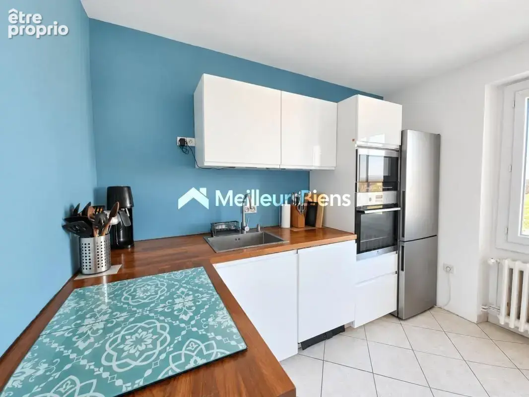 Appartement T4 proche centre-ville - photo 7