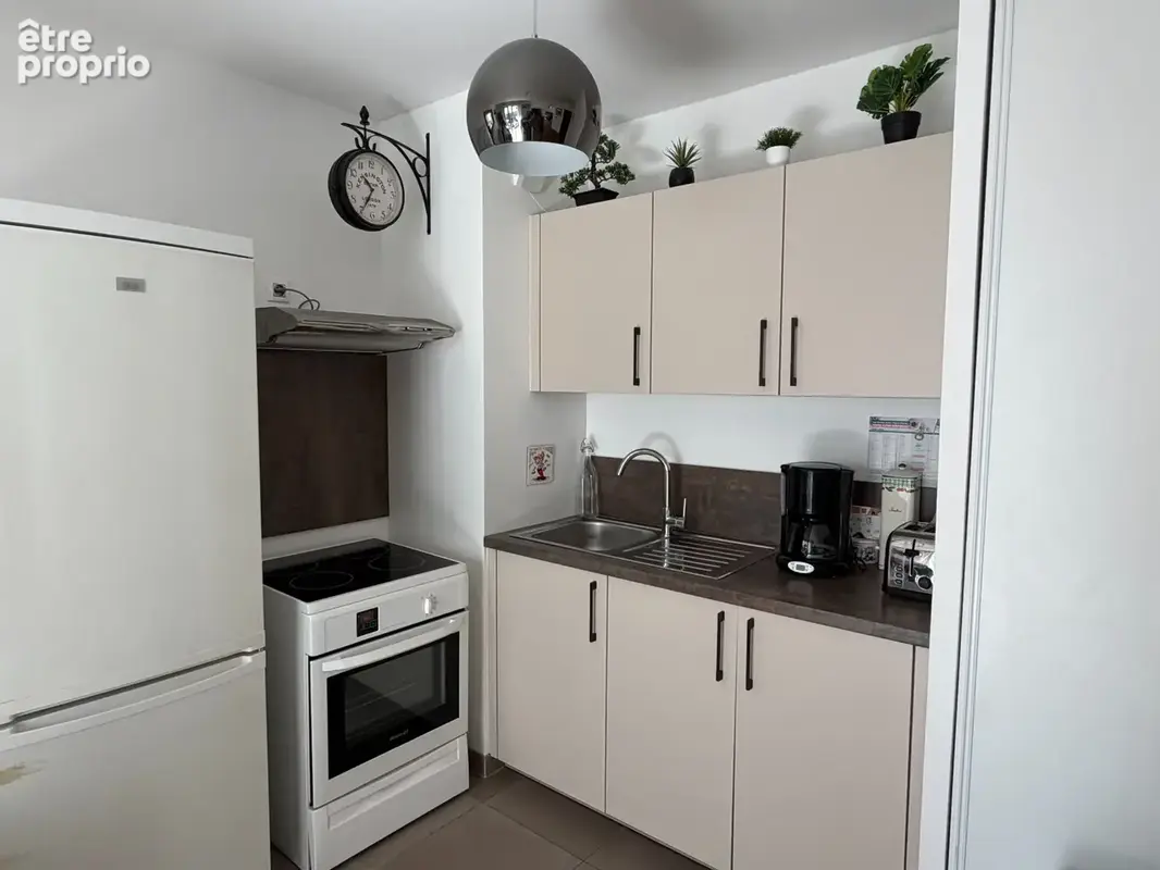 EXCLUSIVITÉ – Appartement récent, balcon, parking et gare à pied : un 2 pièces prêt à vivre ! - photo 6