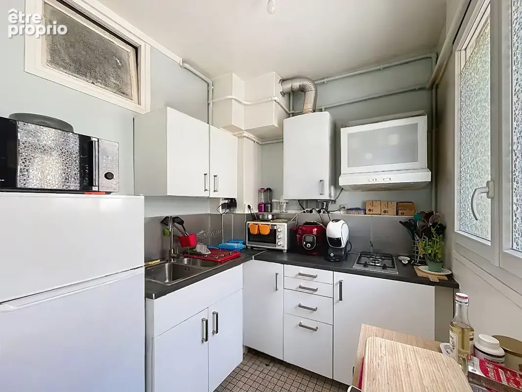 F2 de 50 m² avec balcon et cave / Rue Armand Carrel - photo 3