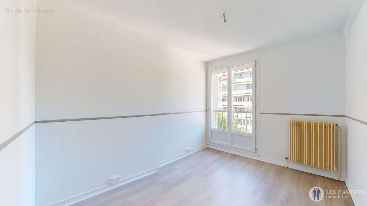 Appartement T3 de 64m2 avec balcon + cave + place de parking - photo 9