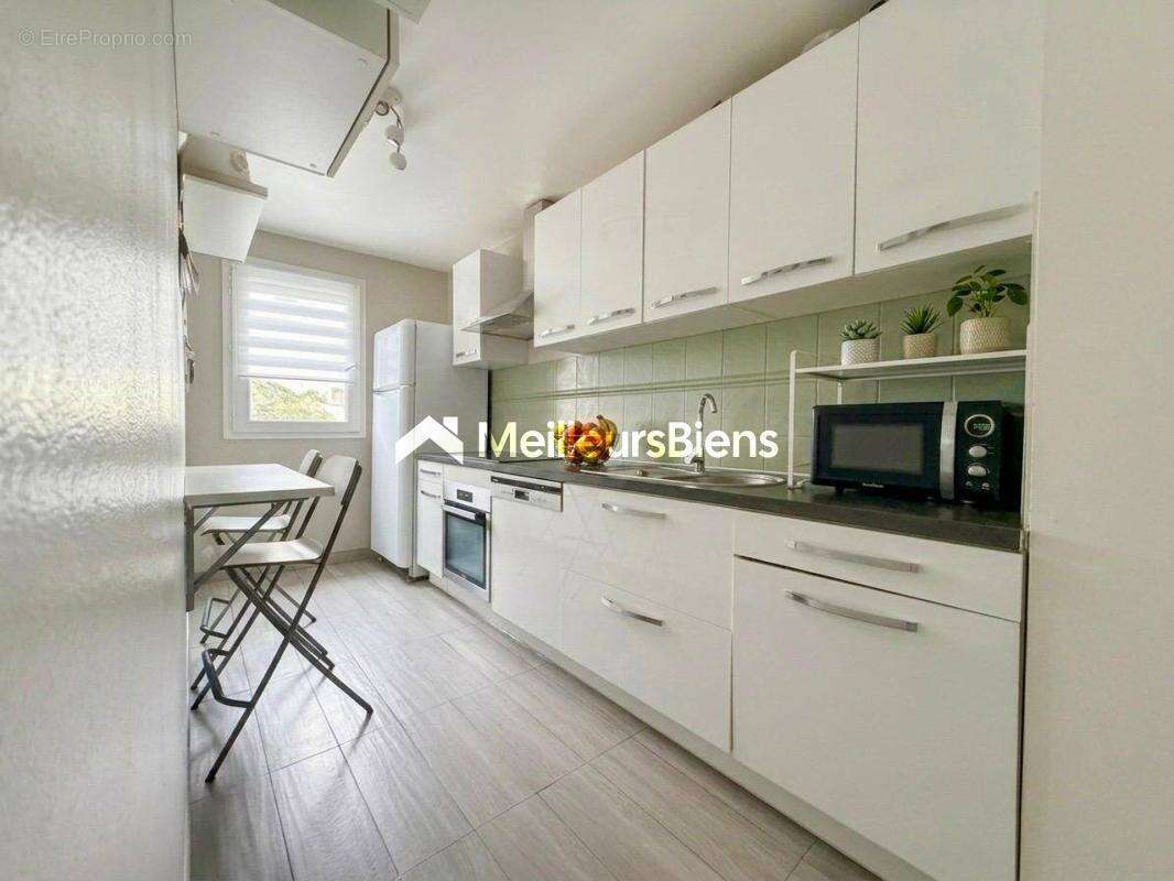 Appartement 3 pièces de 61,51 m² avec balcon et parking à Saint-Ouen-l'Aumône - photo 4
