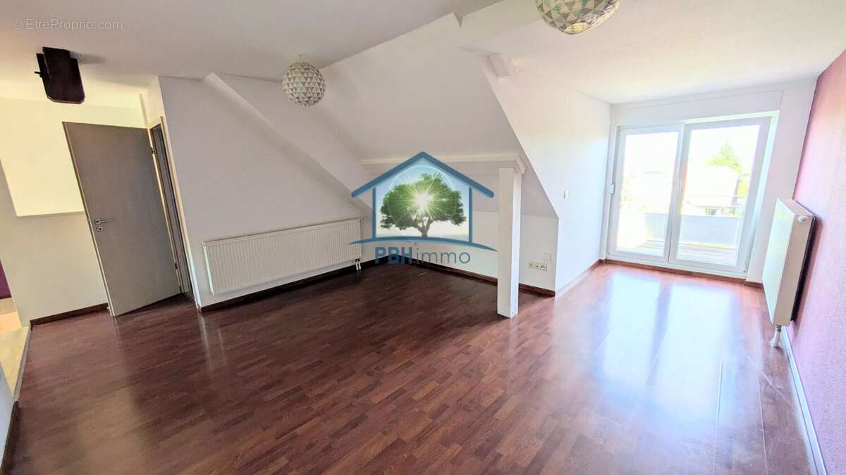 RIEDHEIM (67) - Appartement Duplex inversé F4/5 avec Terrasse, Cave et Parkings - photo 14