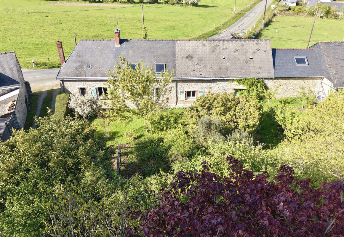 Maison à JUVIGNE