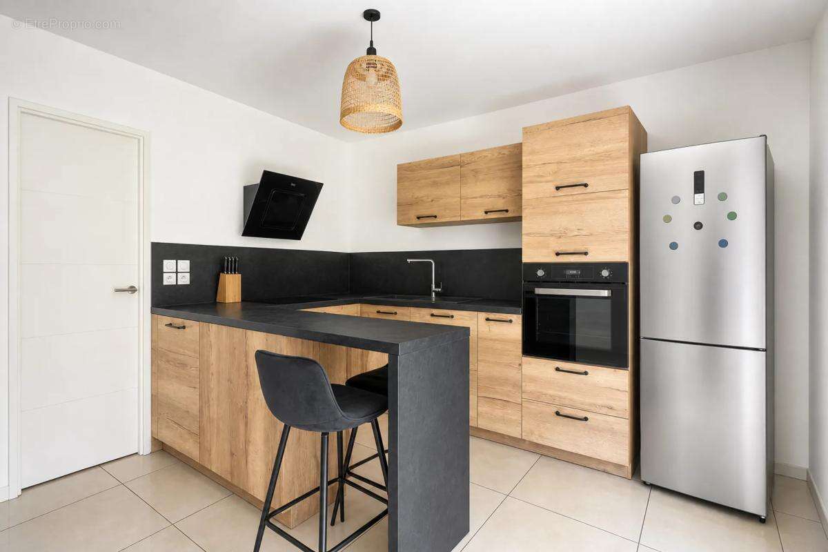 Appartement de 3 pièces de 66 m² à Sainte-Foy-lès-Lyon - photo 4