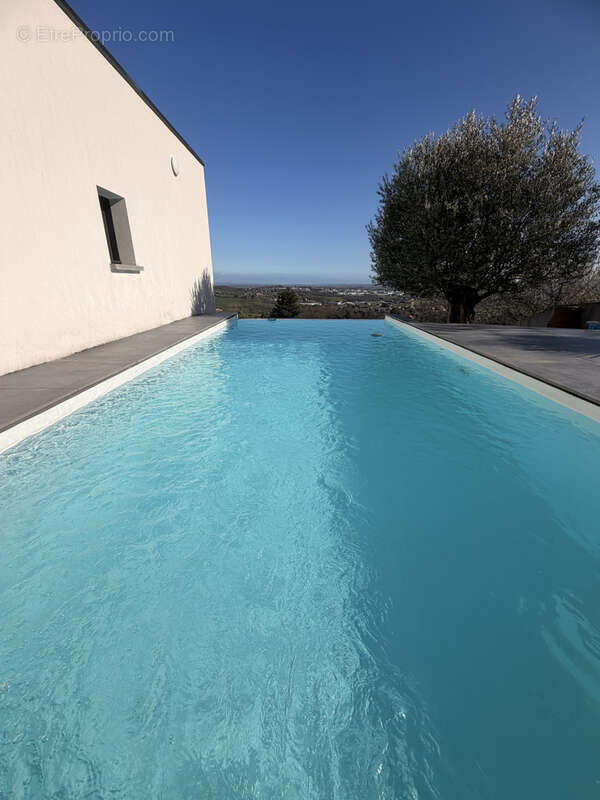 Villa contemporaine d’exception de 208m2   Vue panoramique, calme absolu et prestations haut de gamme - photo 6