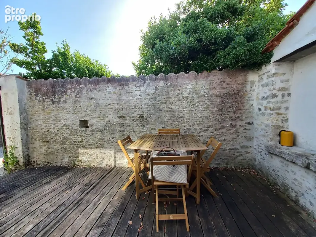 Ancien chai rénové de 57 m² avec patio : charme et authenticité ! - photo 2